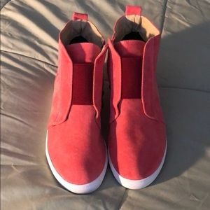 Never worn.  Platform Tennis